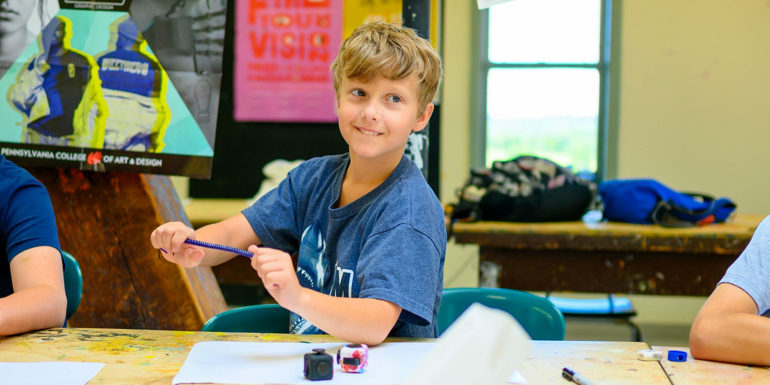 Happy kid in arts and crafts