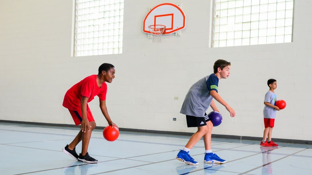 Boys playing basketball