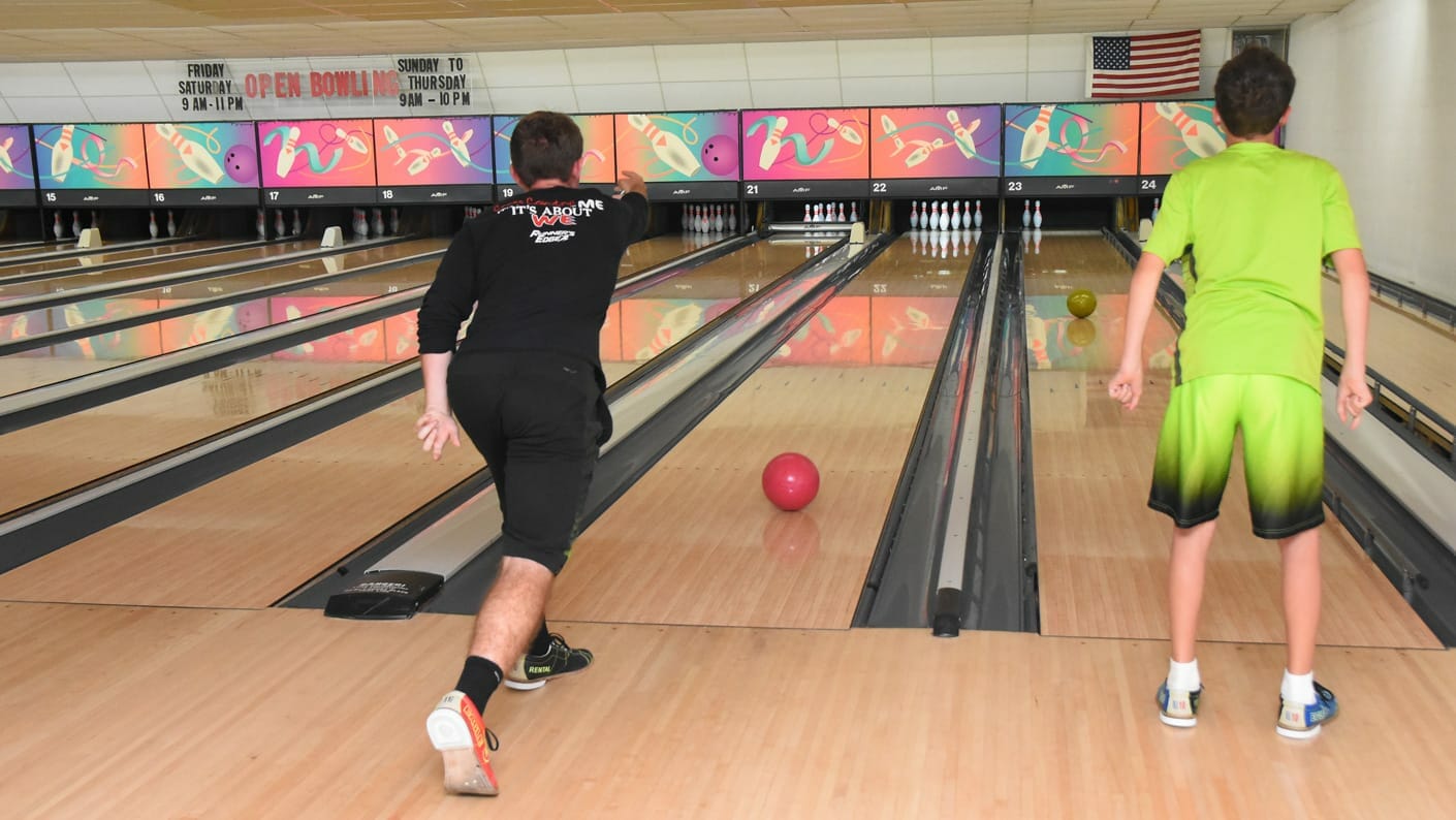 Campers on a trip bowling