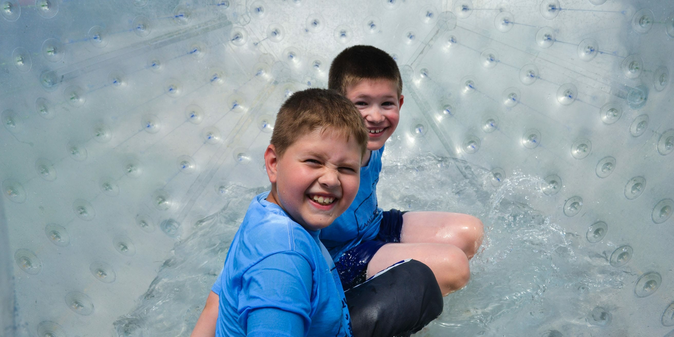 Two kids on the giant bubble