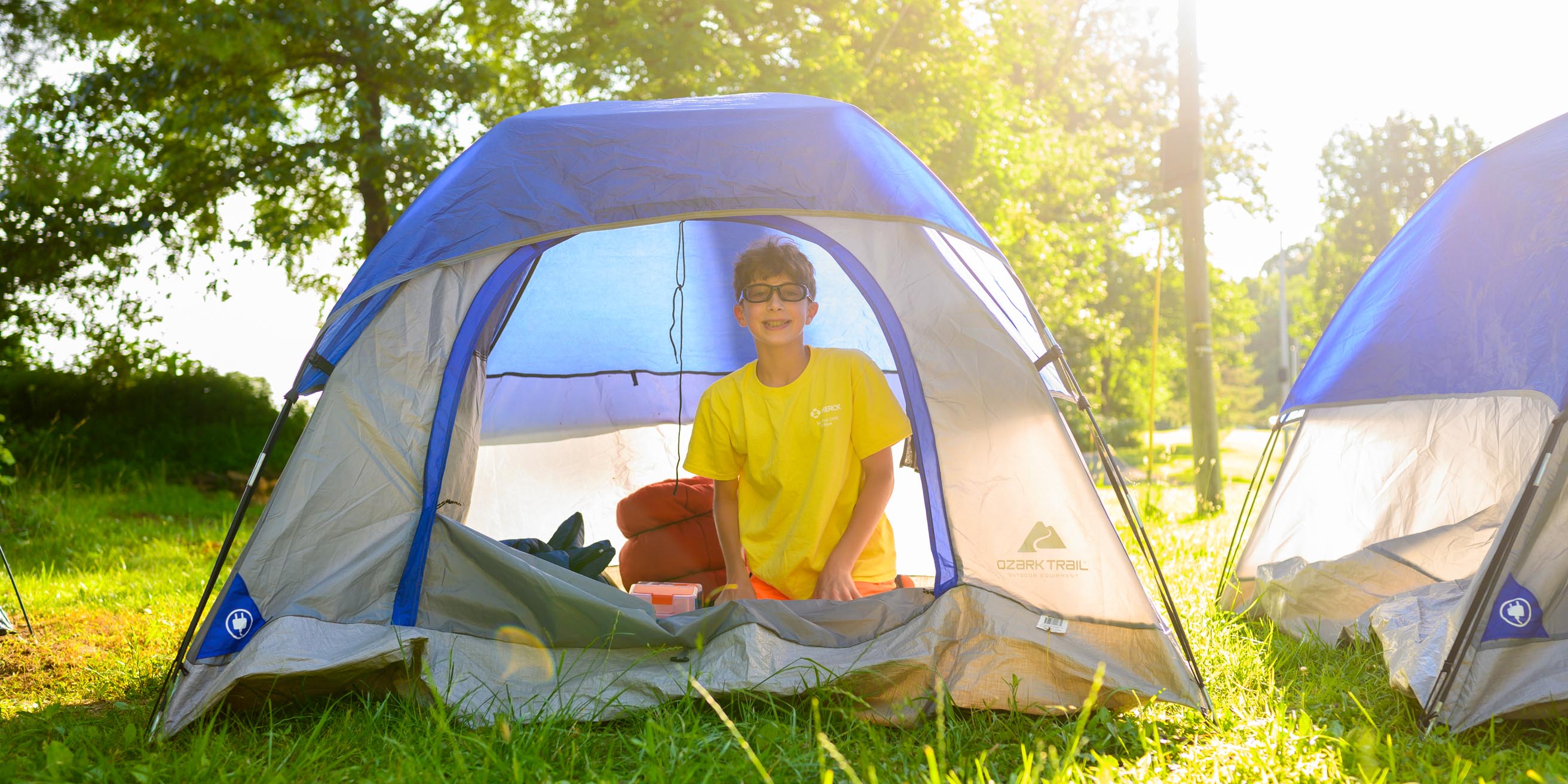 Camper sitting in tent