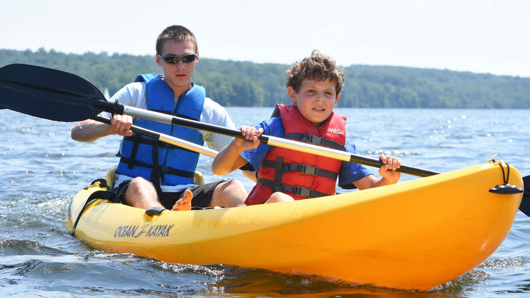 Camper and staff kayaking