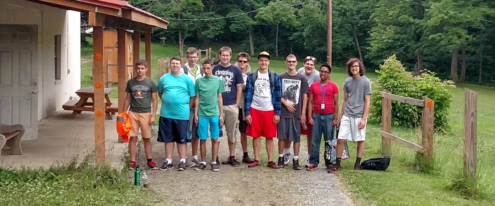 Teens on the LIT program standing outside and smiling