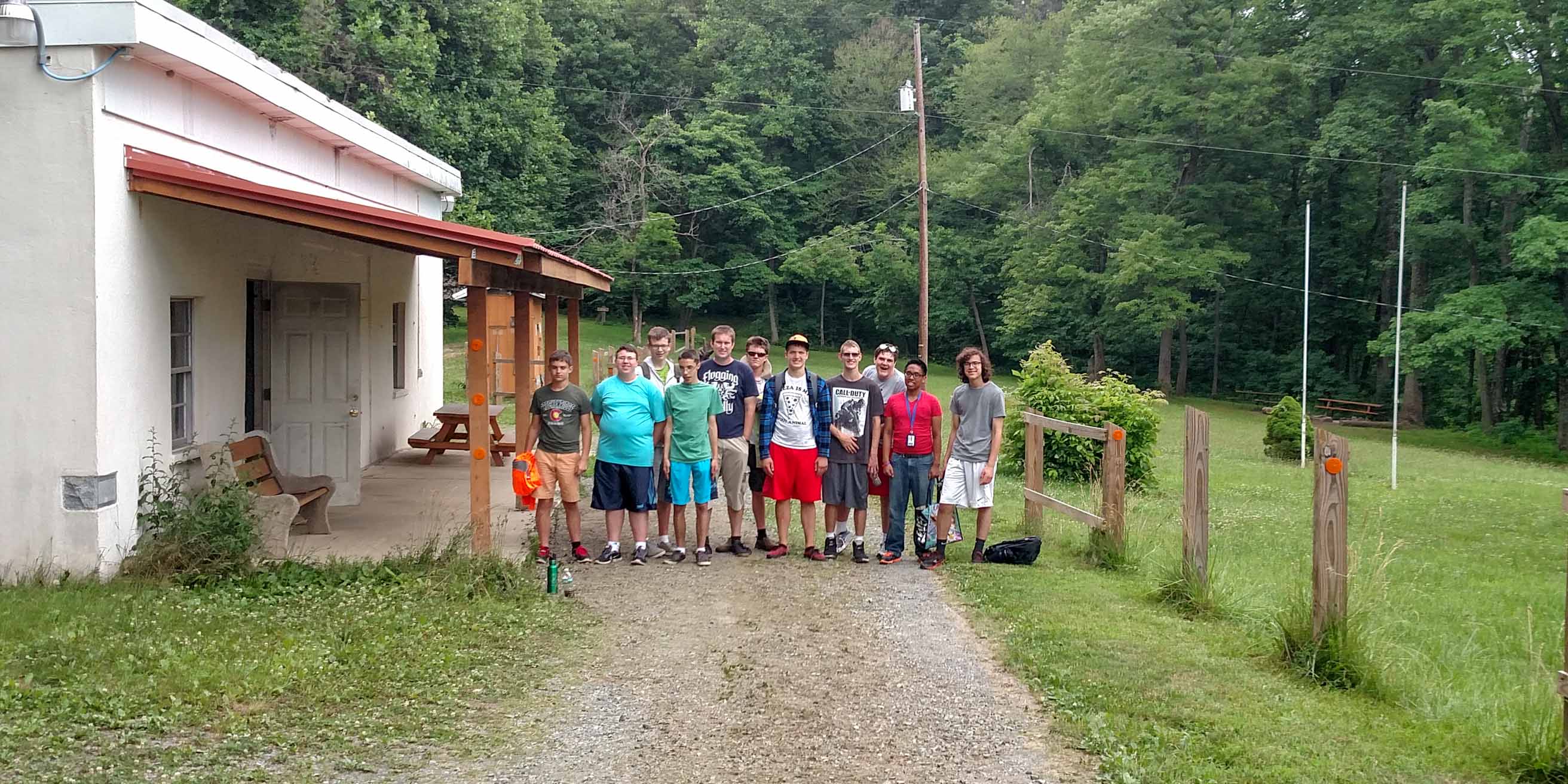 Teens on the LIT program standing outside and smiling