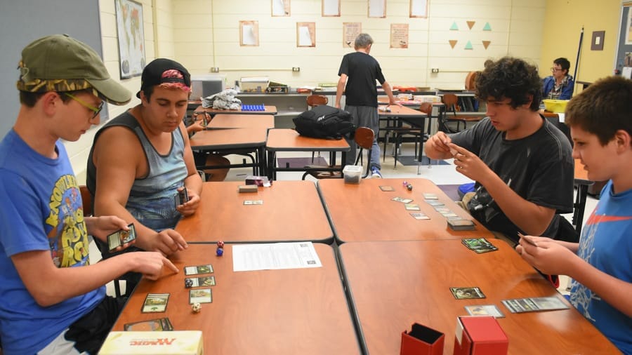 Campers playing a magic tournament