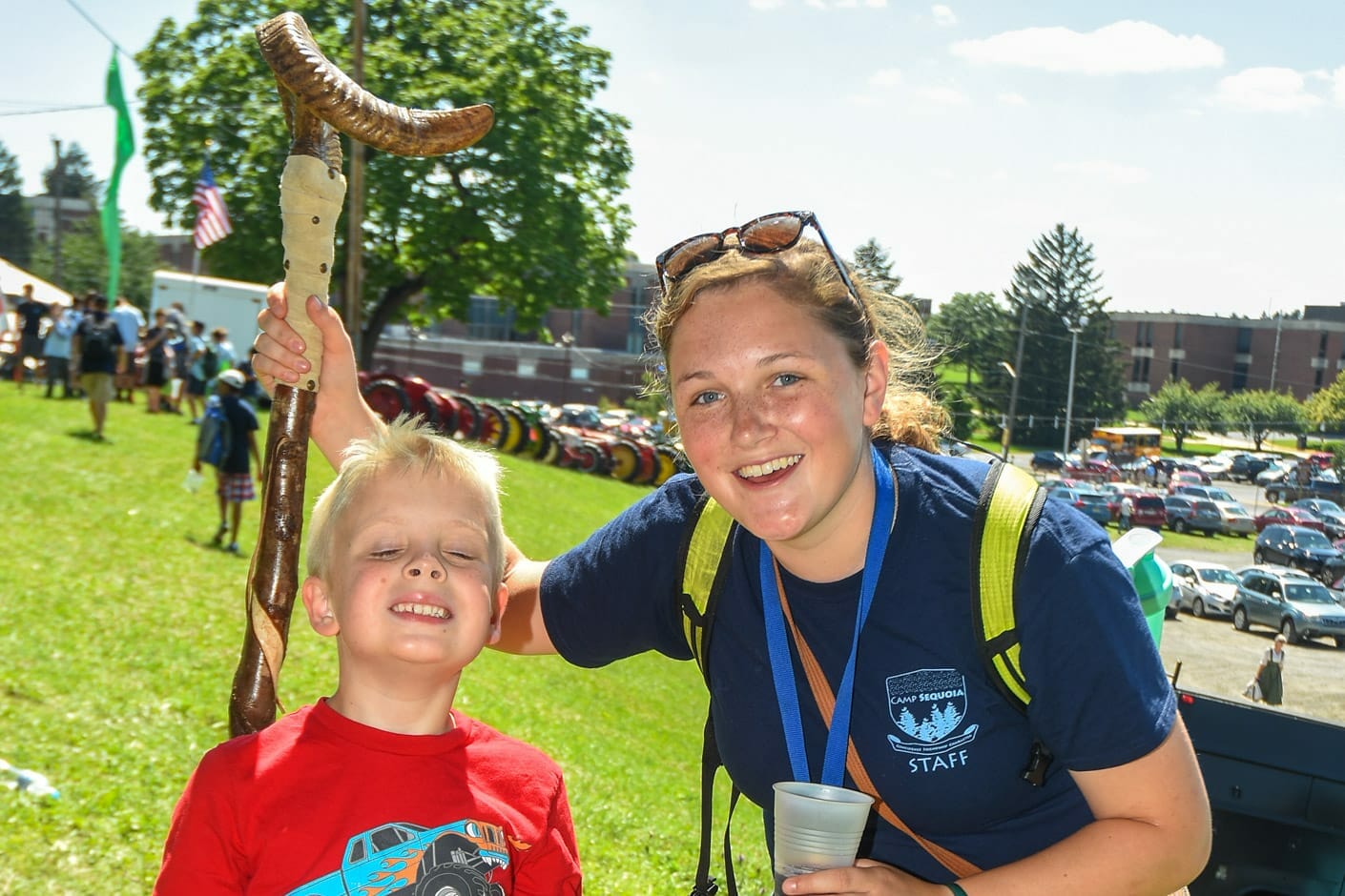 Staff holding a walking stick