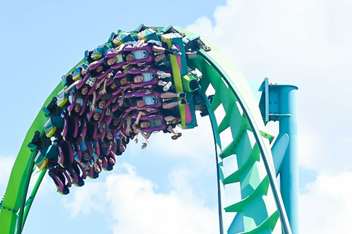 Campers riding a roller coaster at Hershey Park for an overnight trip