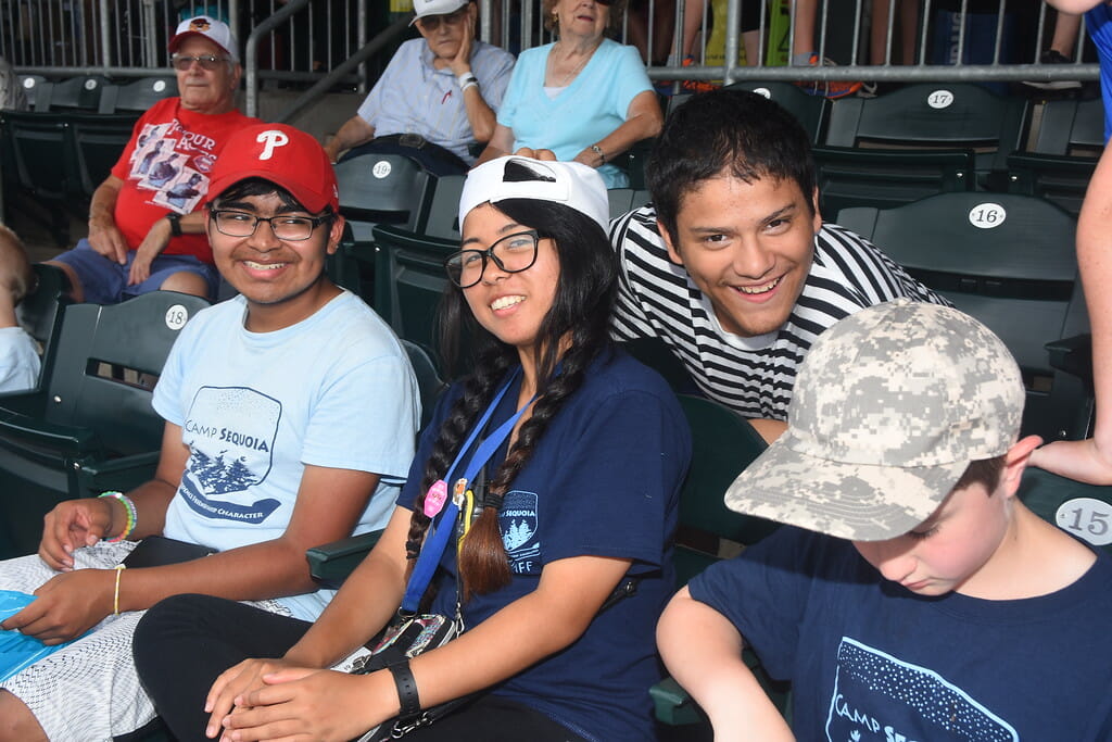 A counselor with campers